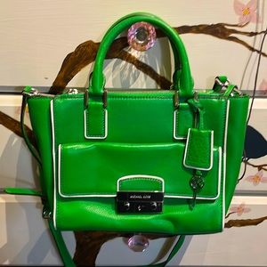 This Michael Kors bag stands out in bright green!